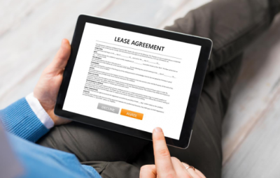person reviewing lease options on lease agreement