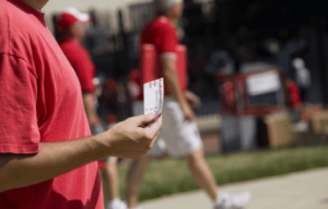 A ticket scalper looking to sell tickets at a game.