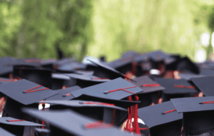 Overhead image of graduation caps.