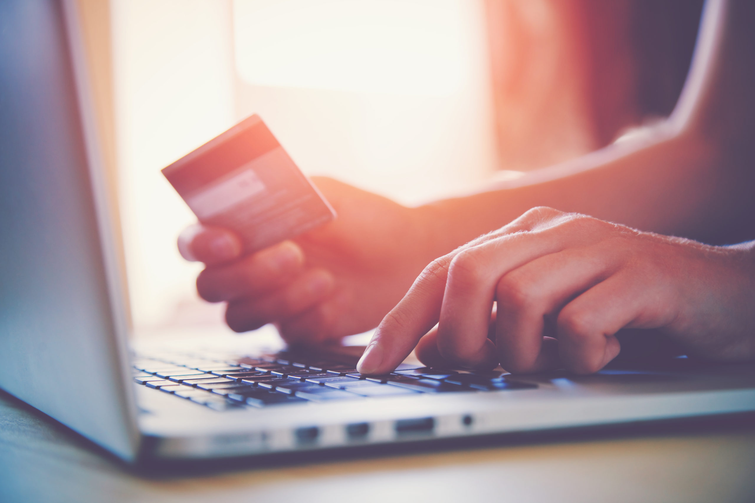 Hands,Holding,Credit,Card,And,Using,Laptop.,Online,Shopping