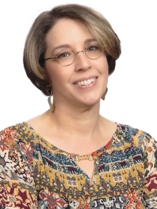 Duo-tone headshot of Amy Dorn with a pink to yellow background.