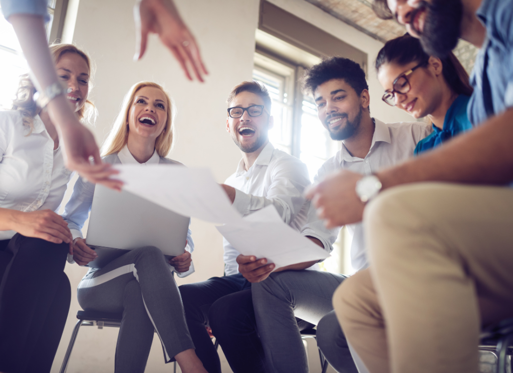 A group of business group of people at work together in an office.