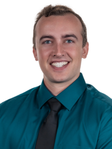 Professional headshot of Ryan Miller.