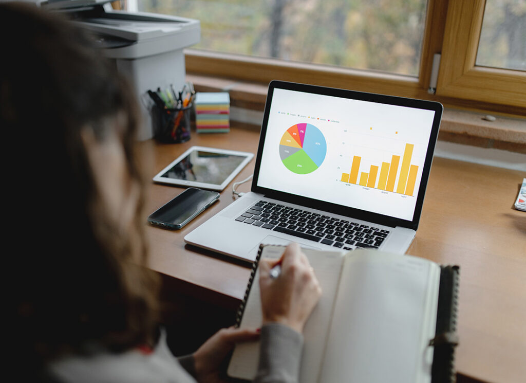 Woman conducting Compensation and Benefits Analysis for strategic value