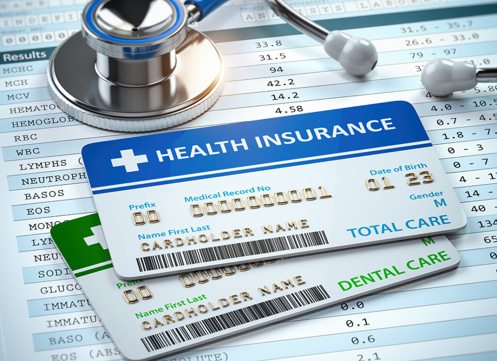 SMBs Are Racking Up ACA Penalties. Here’s How to Avoid Them.. Health Insurance cards total and dental care with stethoscope.