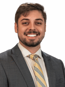 Professional headshot of Logan Davis.