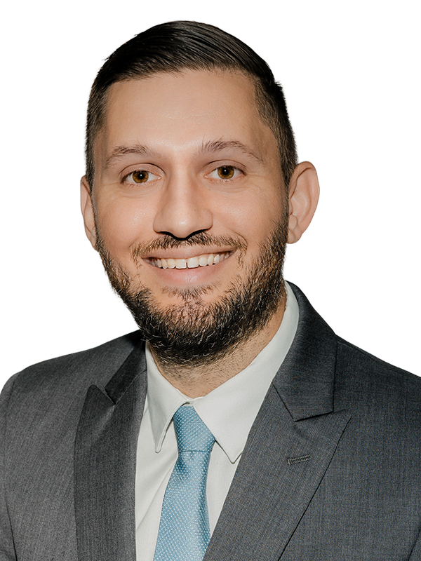 Professional headshot of Sean Sarkissian with blue to green overlay gradient.