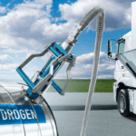 A hydrogen fuel truck refuels using a hydrogen pump, representing clean energy incentives and Hydrogen & Fuel-Cell Tax Credits under the OBBBA.