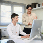 Expert insights on AI in manufacturing: implementation strategies, cybersecurity risks & workforce prep.