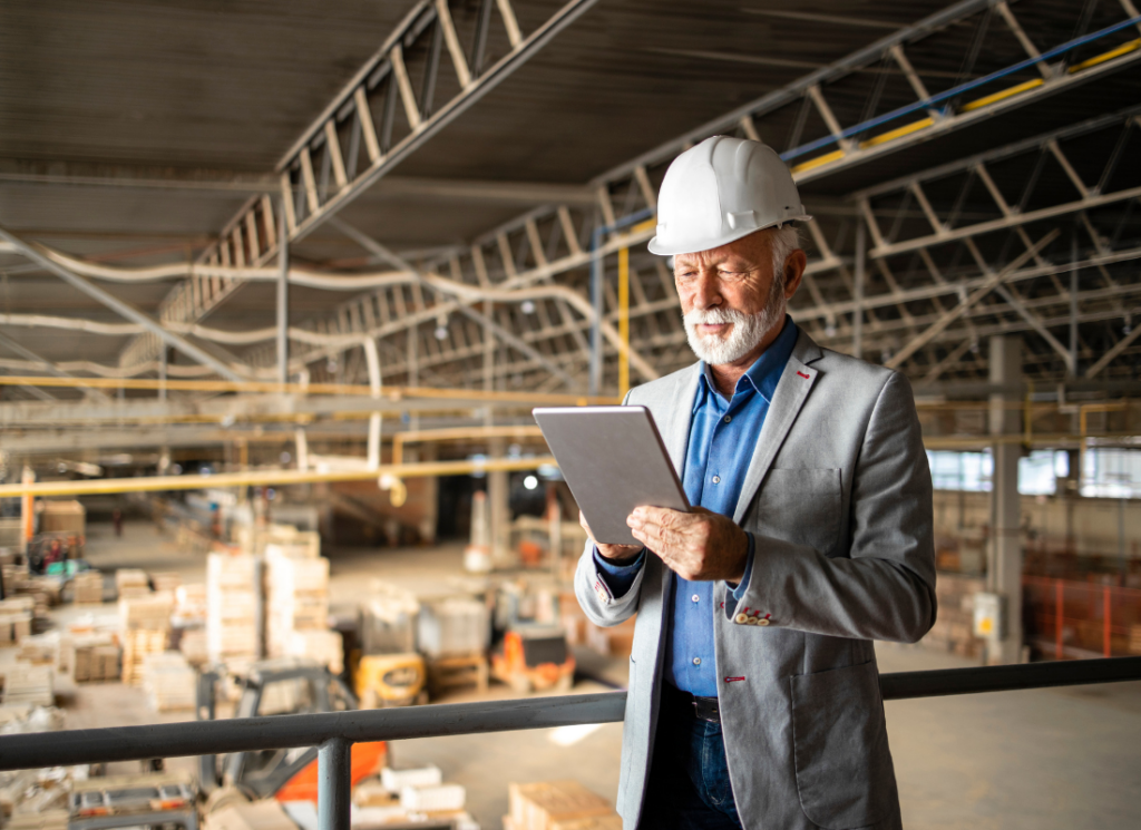 Manufacturing business owner reviewing debt and equity financing options for equipment and growth capital.