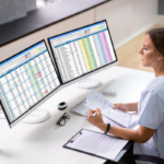 Medical practice manager reviewing staffing budget and hiring timeline for new healthcare practice