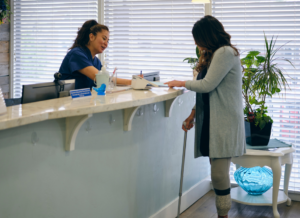 Patient making a payment at doctor's office