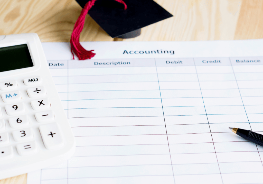 GASB 96 SBITAs featured image 1100 x 800 A calculator, pen, and small graduation cap are on top of piece of paper that appears to be a financial statement.